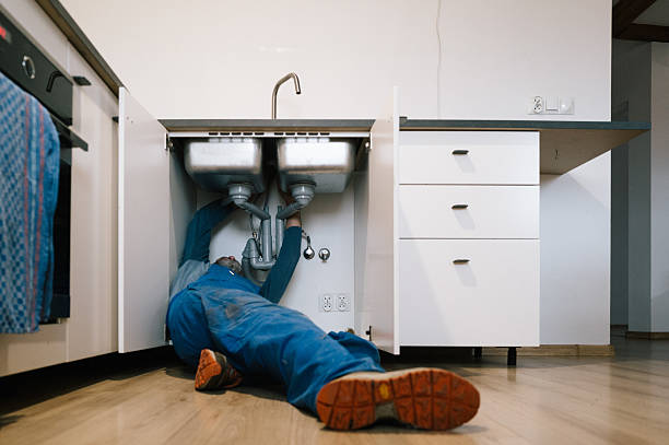 Professional Drain Cleaning technician working in Paris, TN